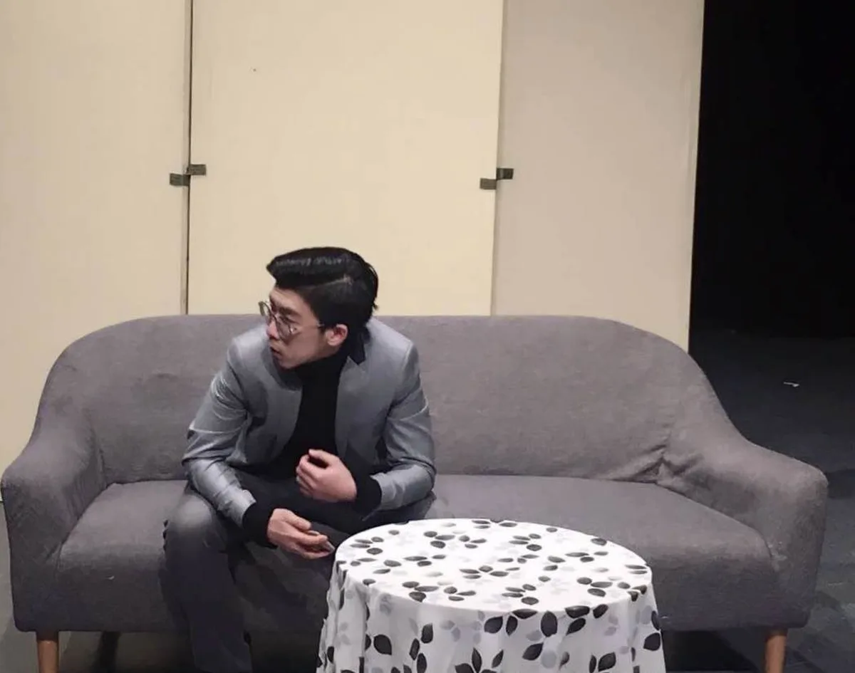 Felix performing in a theatre production